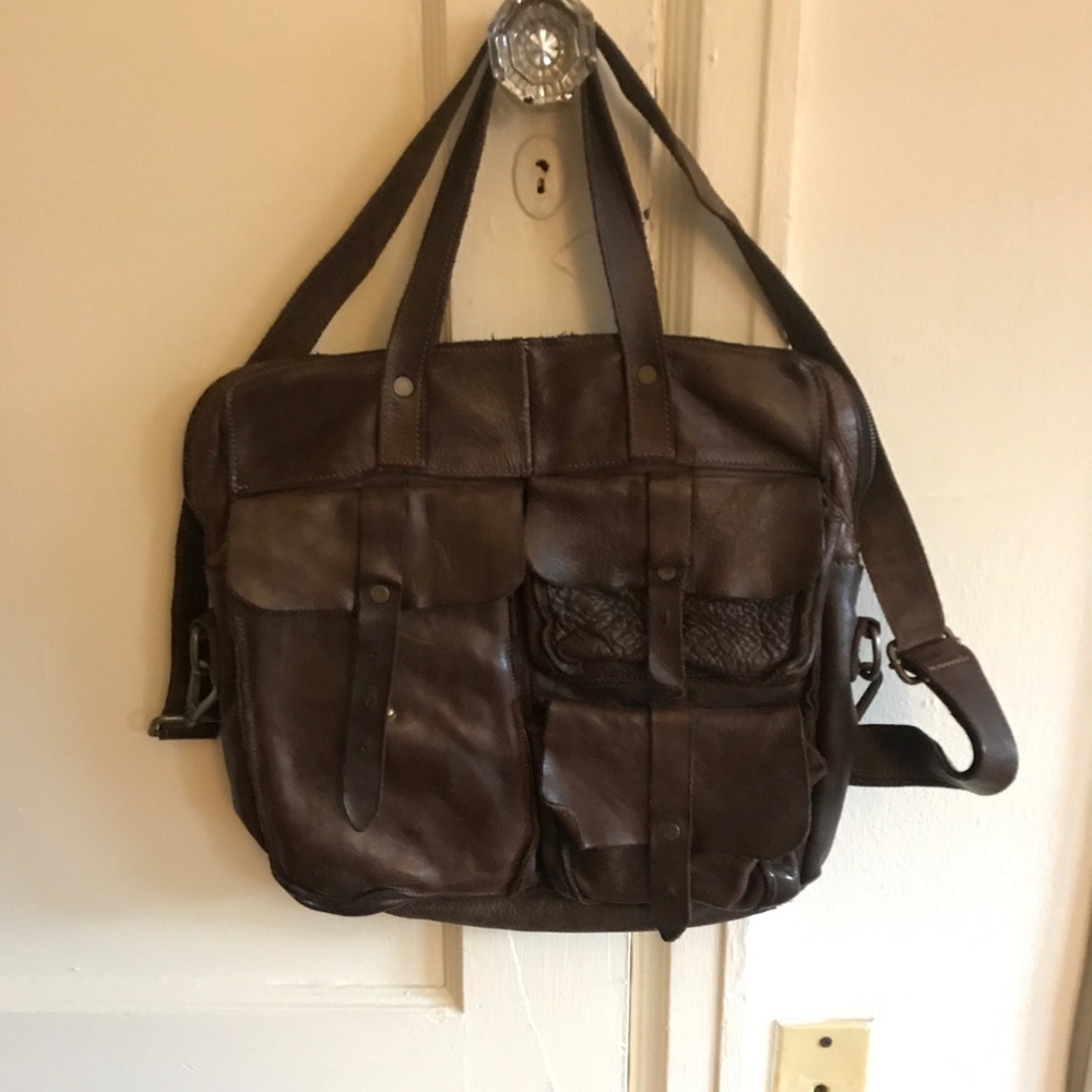 Handmade soft broken in Italian leather handbag.